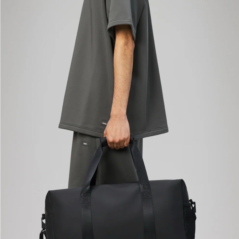 Rains Black Duffel Bag Modern Minimalist Travel